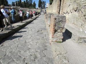 Cobblestone streets with curbs and sidewalks